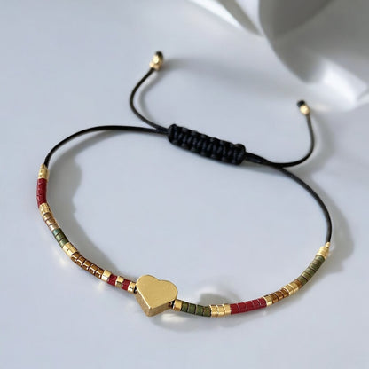 Pulsera hilo mijuki mini corazón oro