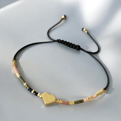 Pulsera hilo mijuki mini corazón oro